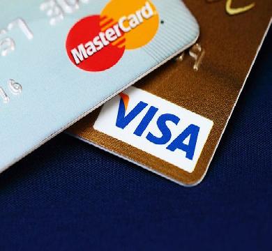 خسائر بالجملة لأسهم البنوك الامريكية وفيزا وماستر كارد بعد قرار فائدة 10 %